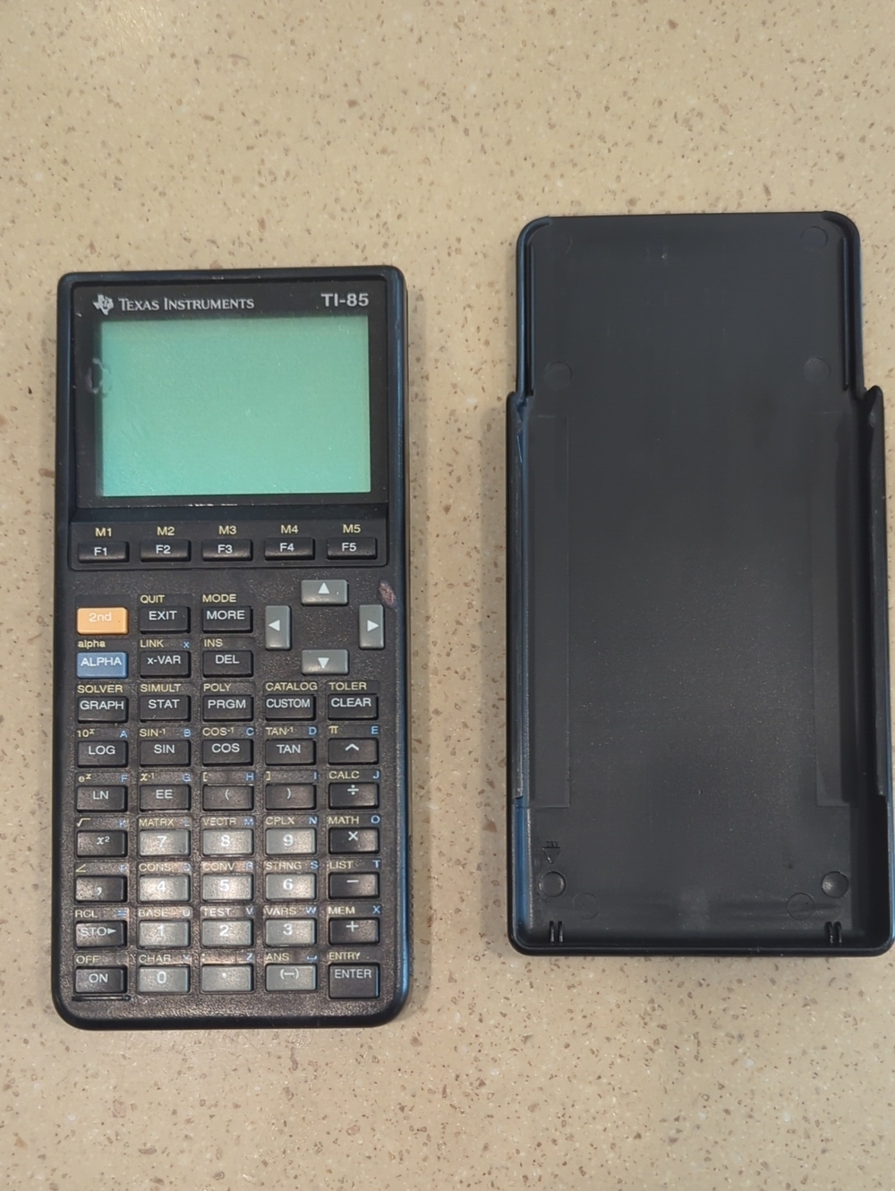 Texas Instruments TI-85 Graphing Calculator in Black with Green Display